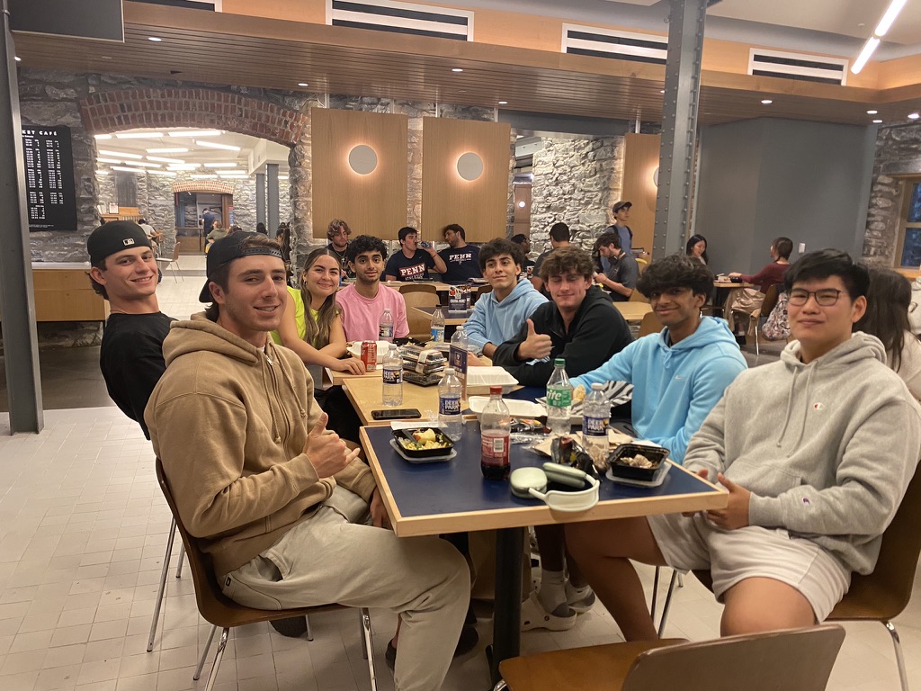 Fisher Hassenfeld residents eat together in a dining hall