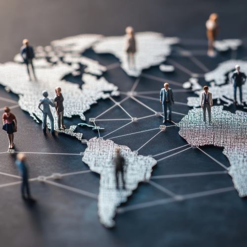 A conceptual image of people standing on a map of the western hemisphere