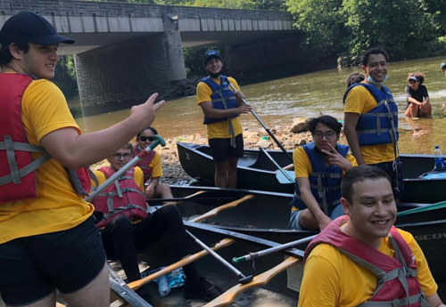 Stouffer Outdoors participants on boats on a river