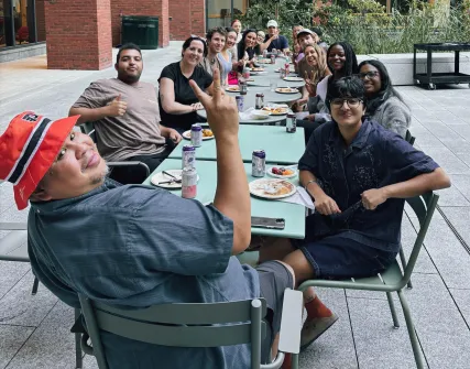 Gutmann residents eat together in the Gutmann Courtyard