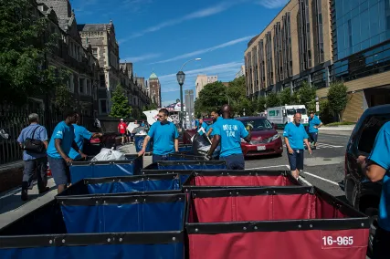 The Penn Move-In team prepares carts for newly arriving College House residents