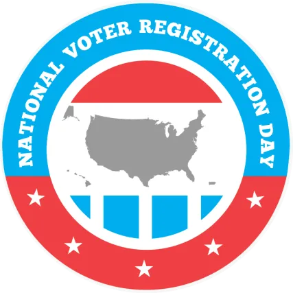 A circular emblem for National Voter Registration Day. The outer ring is blue on the top and red on the bottom, with white stars and bold white text that reads “National Voter Registration Day.” Inside the circle is a stylized depiction of the United States map in gray on a white background, with a red semicircle above and blue geometric shapes below, resembling a patriotic badge.