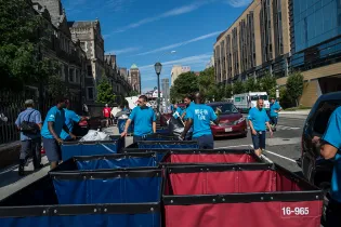 The Penn Move-In team prepares carts for newly arriving College House residents
