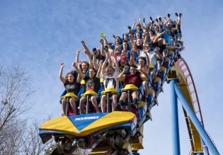 People on a roller coaster.