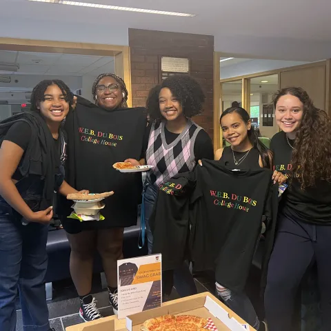 Du Bois residents posing with House T-shirts