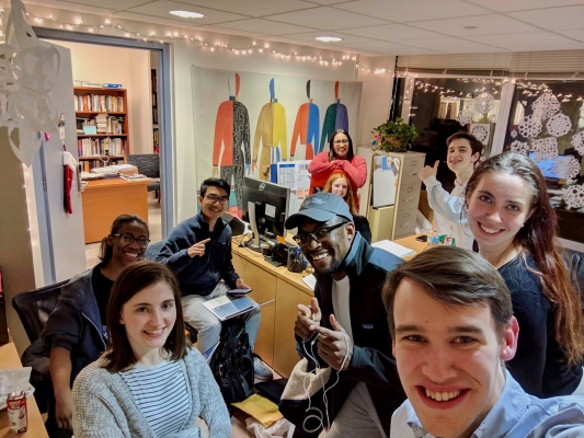A group of students meeting in the Kings Court English House Office