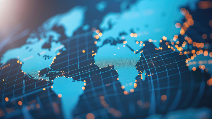 A stylized image of a world atlas with lights indicating major population centers