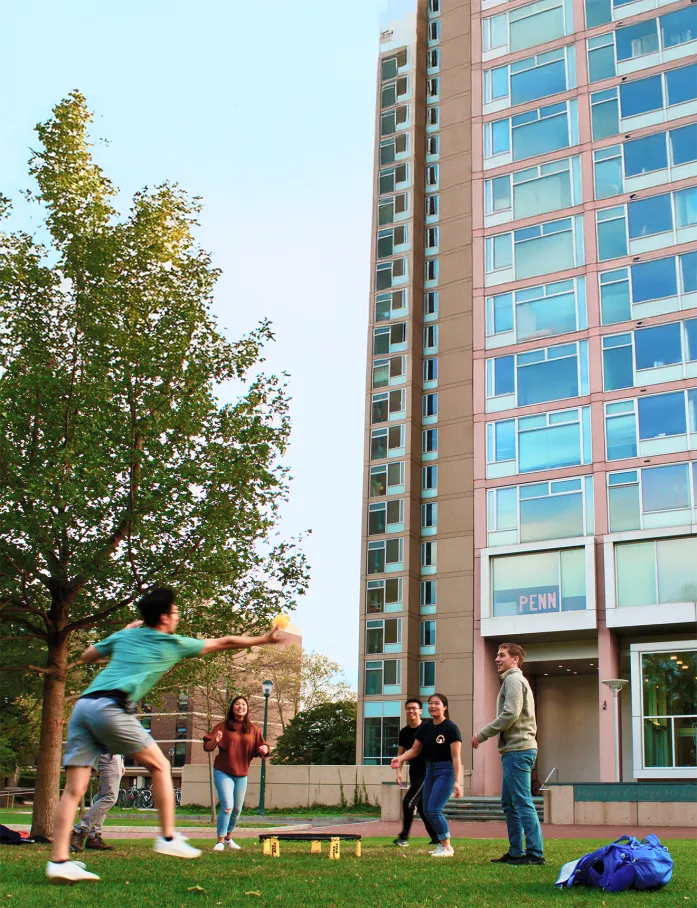 Penn students playing a game outside Rodin College House